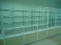 Эконом-панели и комплектующие. Киоски из алюминиевого профиля, витрины, прилавки, торговое оборудование в Уфе. Горки, пристенные стеллажи, металлические шкафы.